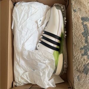 adidas White Golf Shoe with Black Stripes and Lime Green Accent
